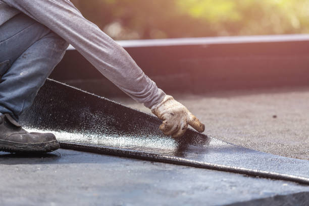 Professional Waterproofing technician working in Teterboro, NJ
